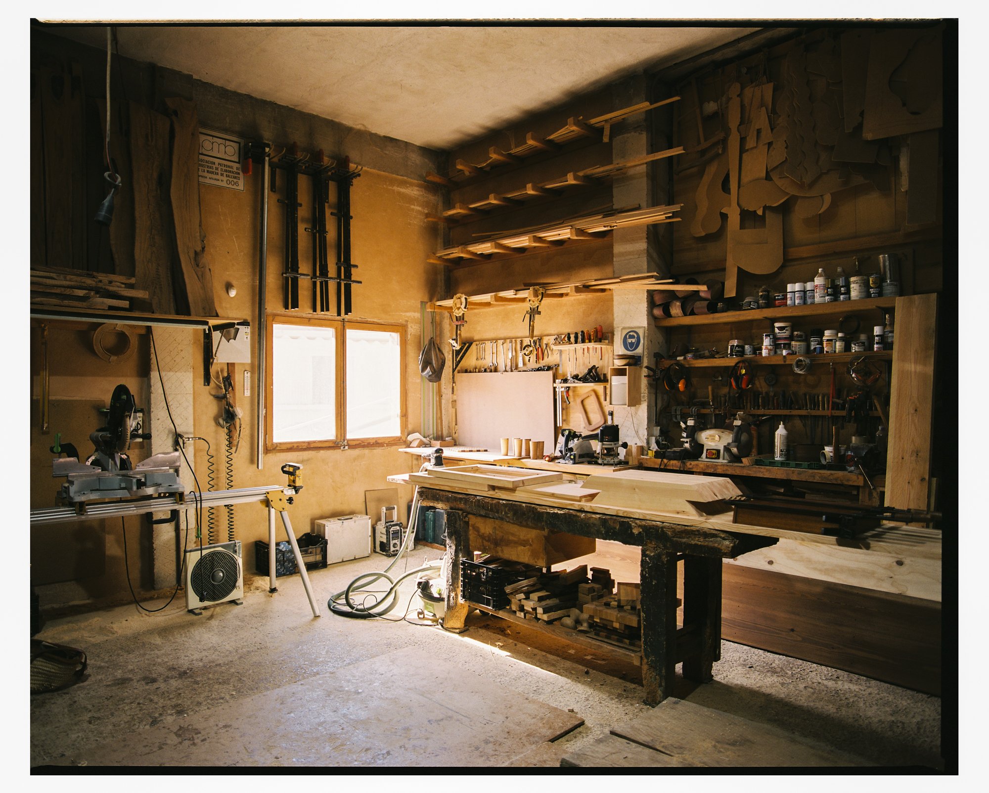 A piece being planed and joined at the bench.
